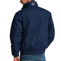 Navy blue jacket with a logo on the back worn by a person, on a white background