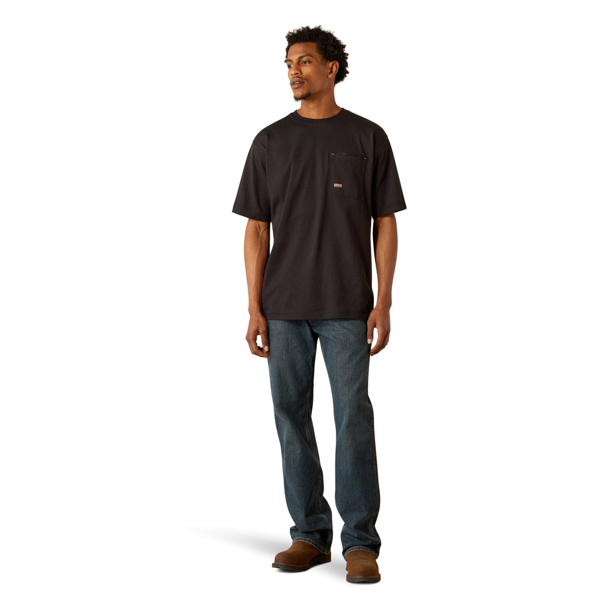 Person wearing a black t-shirt with 'Ariat Work' text on the back, standing against a white background