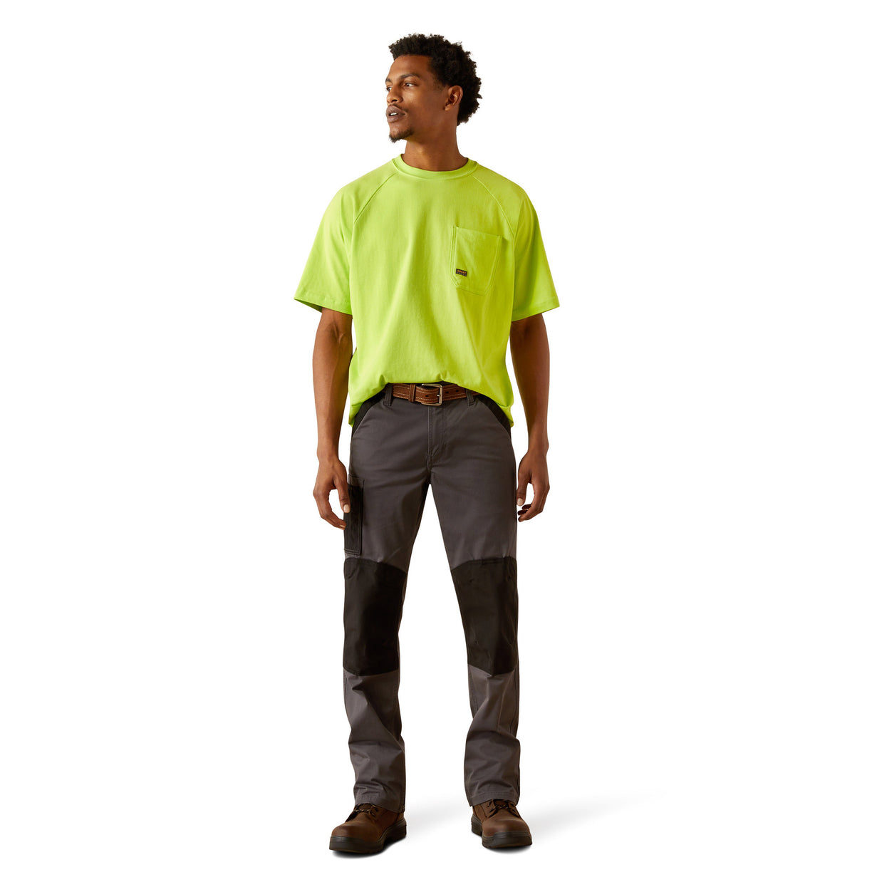 Person wearing a bright yellow t-shirt with a skull and hard hat graphic on the back.