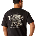 Black t-shirt with 'Ariat Workhogs' graphic on the back, worn by a person.