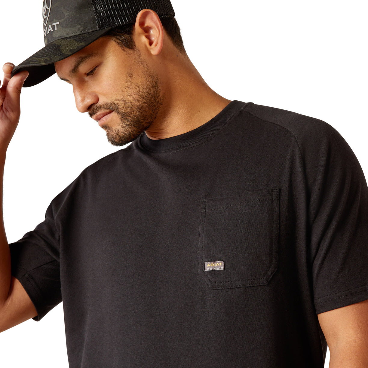Black t-shirt with 'Ariat Workhogs' graphic on the back, worn by a person.