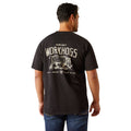 Black t-shirt with 'Ariat Workhogs' graphic on the back, worn by a person.