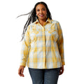 Woman wearing a yellow and white plaid shirt on a white background