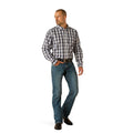 Man wearing a plaid shirt and jeans on a white background