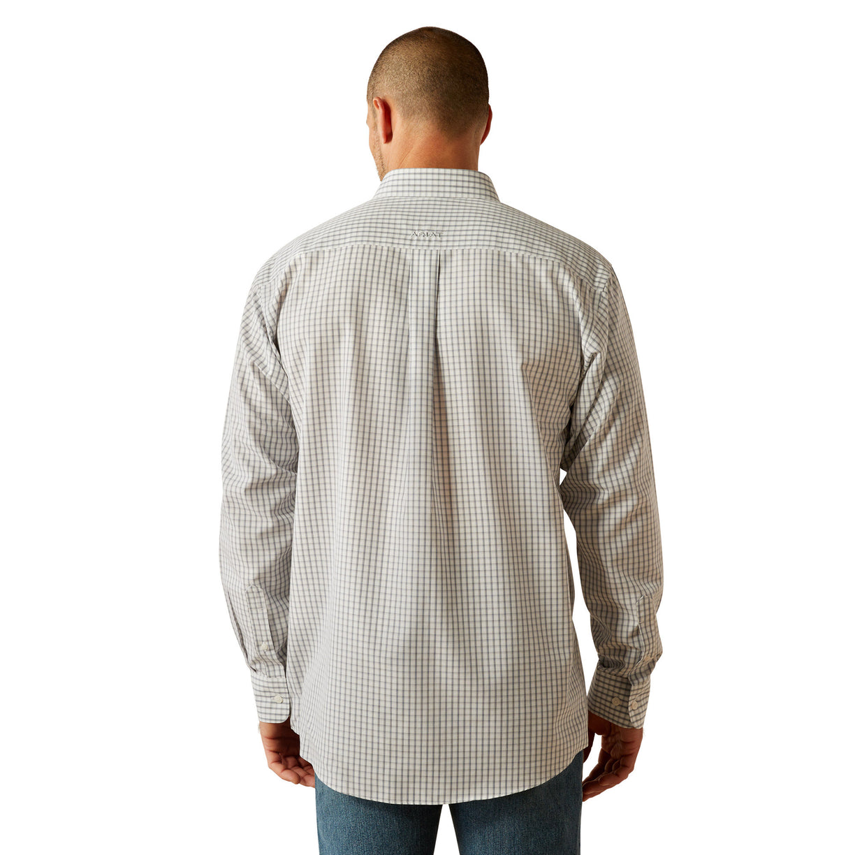 Man wearing a checkered shirt and jeans on a white background