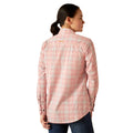 Person wearing a pink plaid shirt on a white background