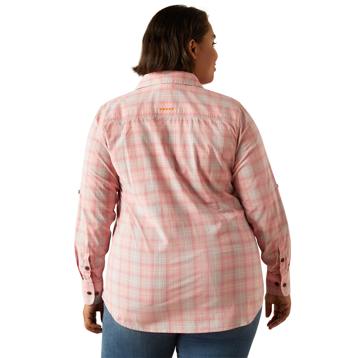 Person wearing a pink plaid shirt on a white background