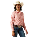 Woman wearing a pink long-sleeve shirt, blue jeans, and a white cowboy hat on a white background