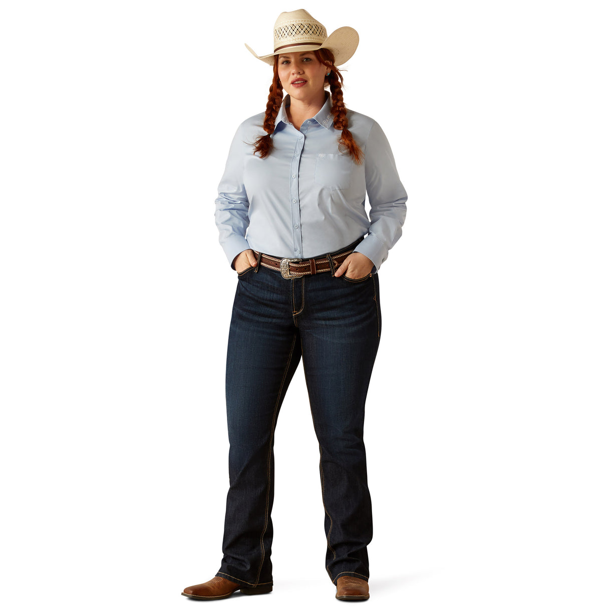 Woman wearing a light blue shirt and jeans on a white background