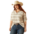 Woman wearing a striped shirt, jeans, and a cowboy hat on a white background