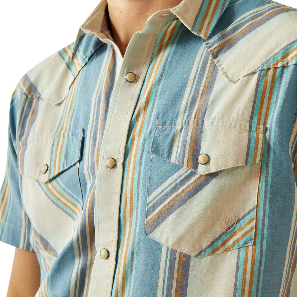 Close-up of a person wearing a striped shirt with a focus on the collar and chest pocket.