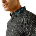 Patterned shirt with Ariat logo on collar and chest, on a white background