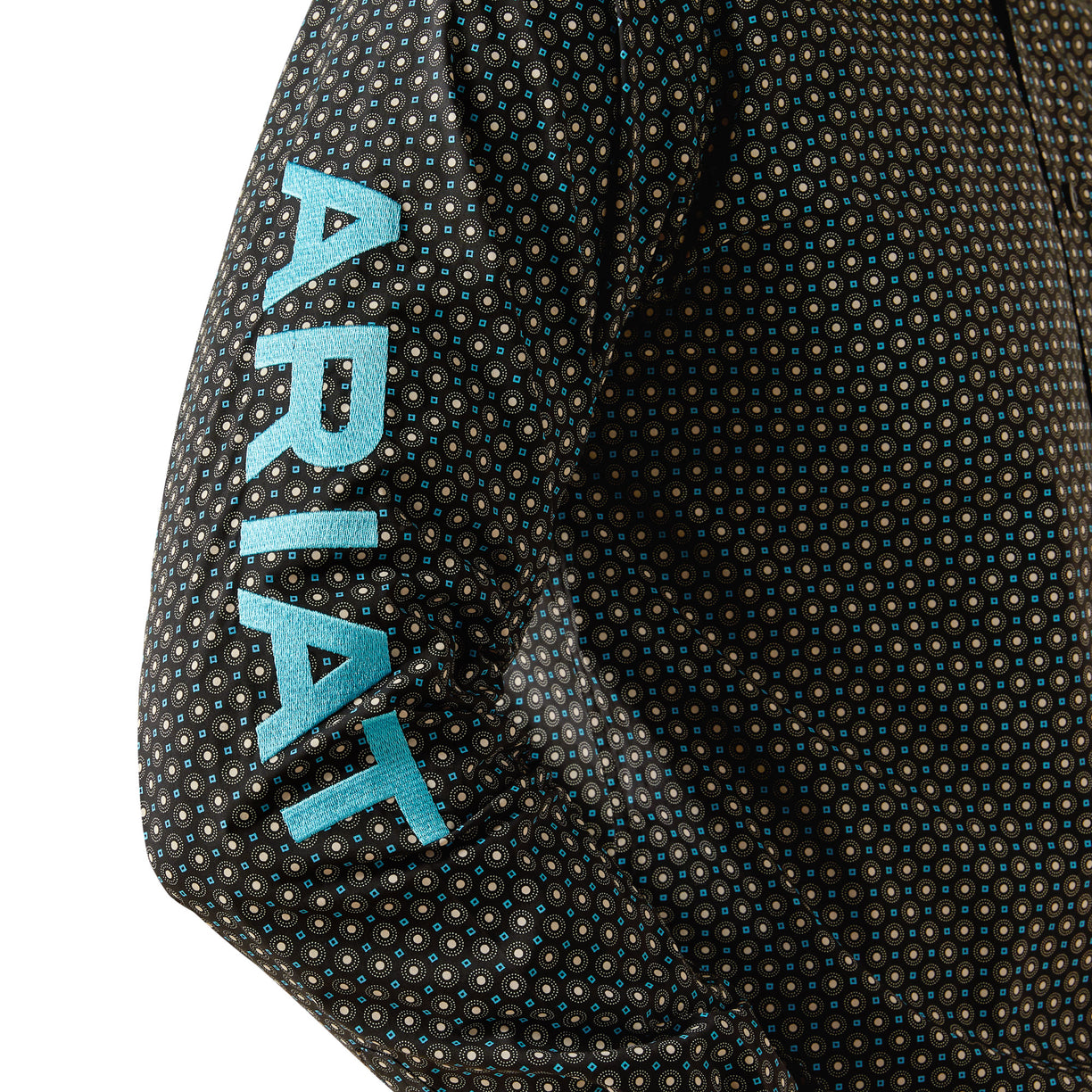 Close-up of a textured jacket sleeve with 'Ariat' branding.