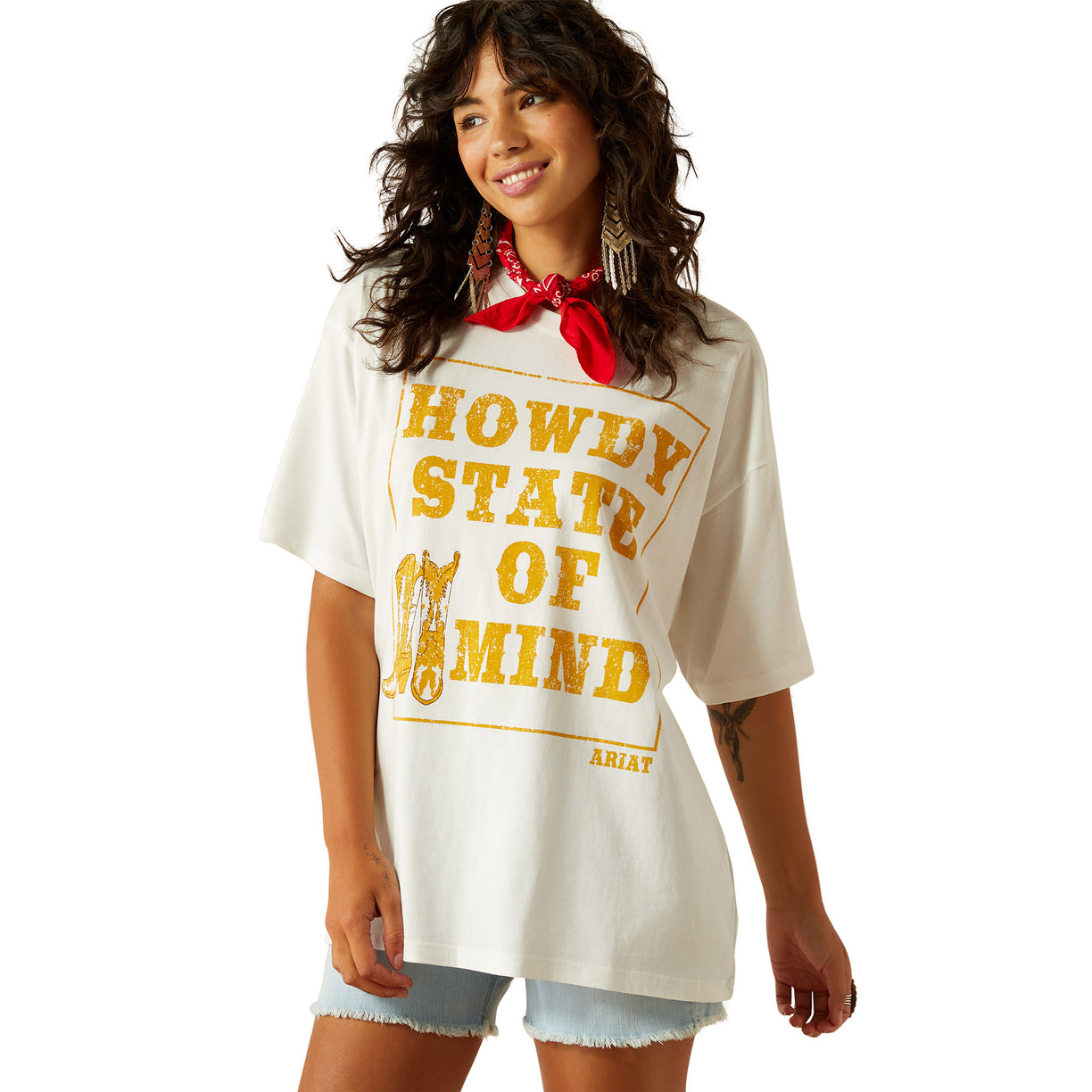 Woman wearing a 'Howdy State of Mind' t-shirt with a white background