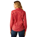 Woman wearing a red striped shirt on a white background