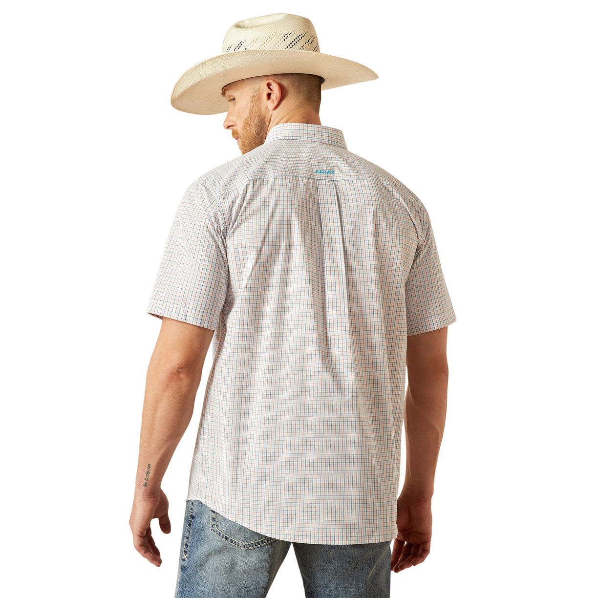 Man wearing a checkered shirt and cowboy hat on a white background