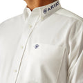 White shirt with Ariat logo on collar and chest pocket against a white background