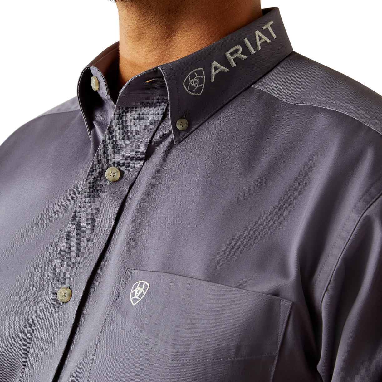 Gray shirt with Ariat logo on collar and chest pocket