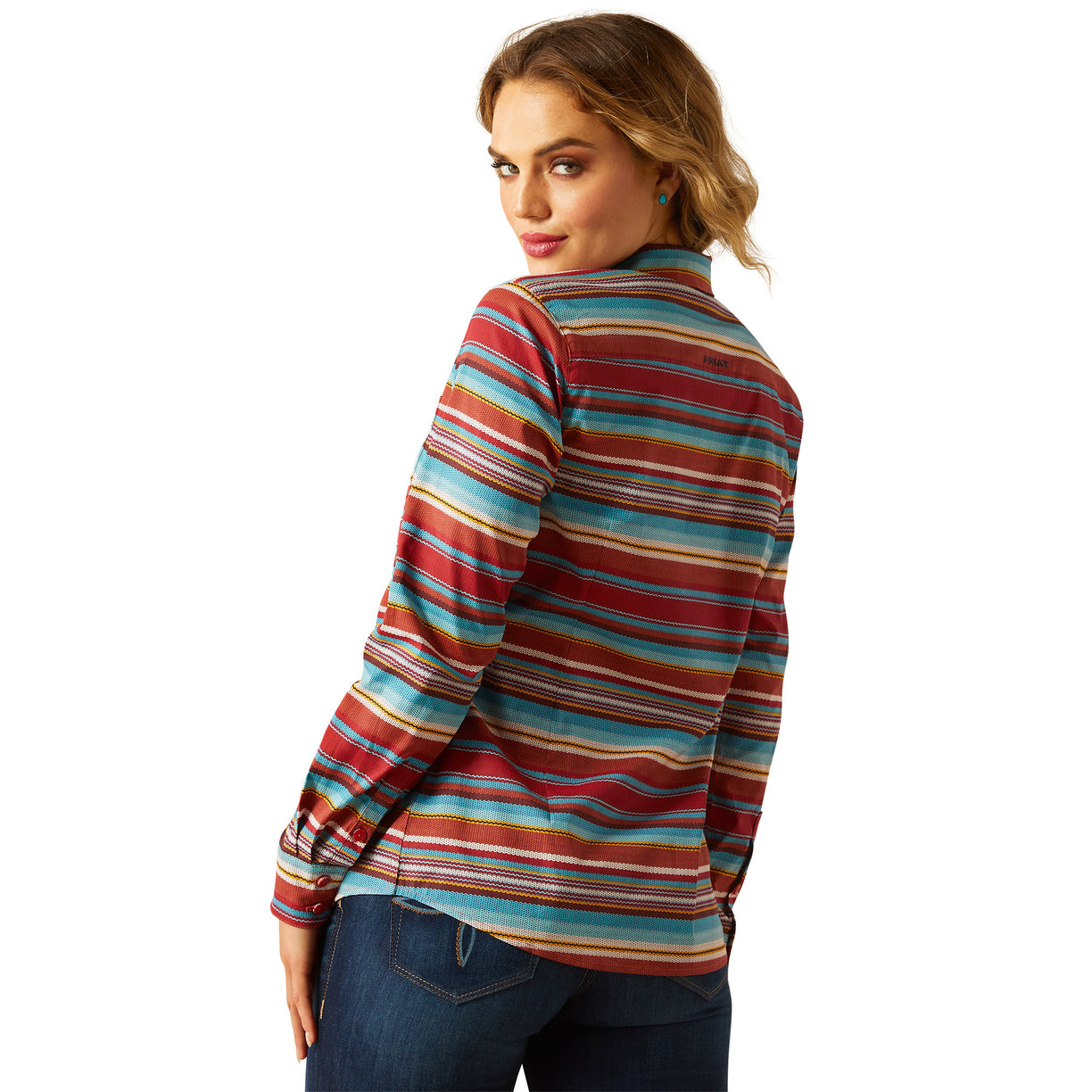 Woman wearing a colorful striped shirt on a white background