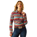Woman wearing a colorful striped shirt and jeans on a white background