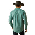 Man wearing a green plaid shirt and cowboy hat on a white background