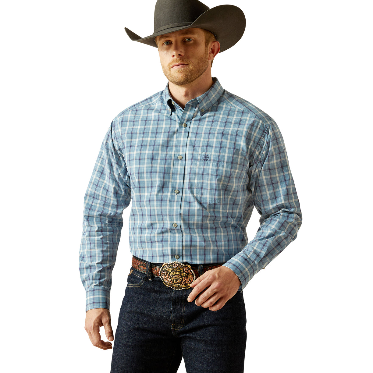 Man wearing a blue plaid shirt, dark jeans, and a cowboy hat on a white background