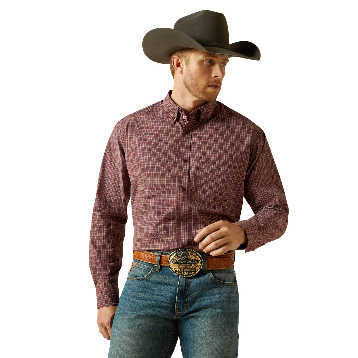 Man wearing a brown checkered shirt, blue jeans, and a cowboy hat on a white background