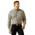 Man wearing a patterned shirt and black pants on a white background