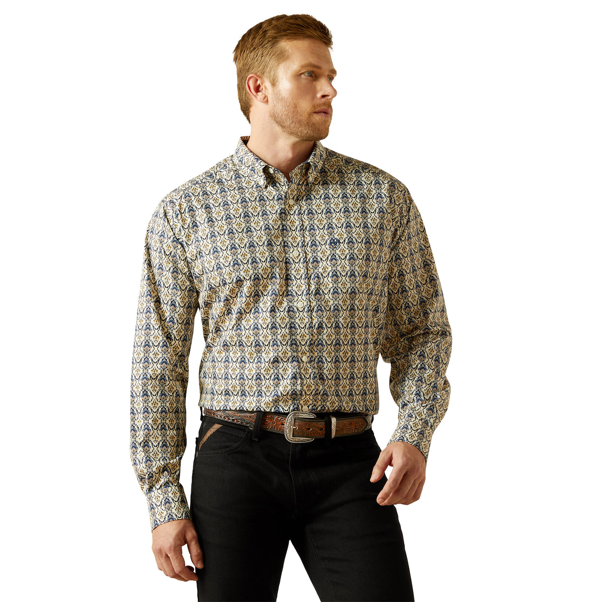 Man wearing a patterned shirt and black pants on a white background