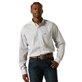 Man wearing a white patterned shirt and blue jeans on a white background