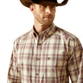 Man wearing a plaid shirt and cowboy hat on a white background