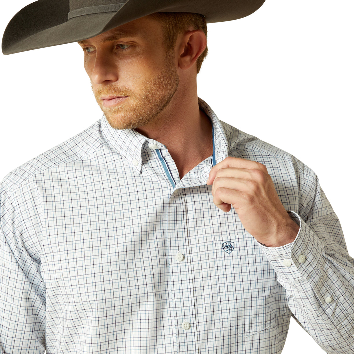 Man wearing a checkered shirt and cowboy hat on a white background
