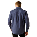 Man wearing a blue plaid shirt on a white background