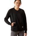 Person wearing a black sweatshirt with a visible brand logo on a white background