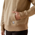 Beige hoodie with a brand logo on the chest pocket against a white background