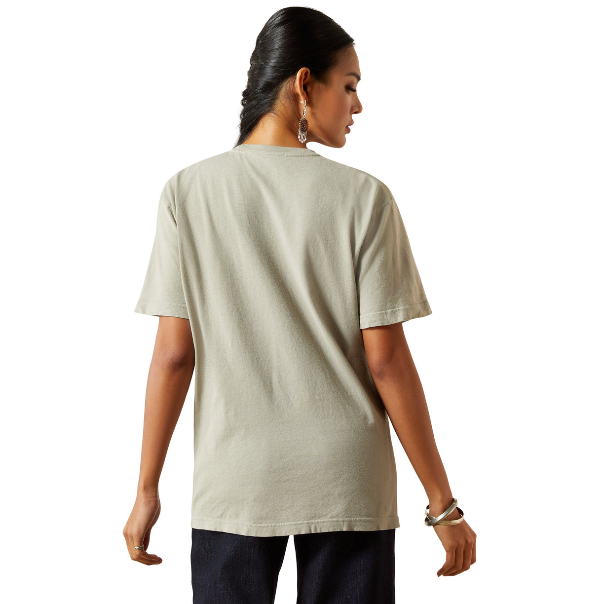 Woman wearing a beige t-shirt on a white background