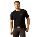 Man wearing a black t-shirt with 'Ariat' logo on a white background
