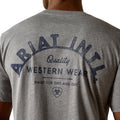 Gray t-shirt with 'Ariat' branding on the back, featuring text about western wear.