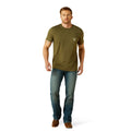 Man wearing a green t-shirt and blue jeans on a white background