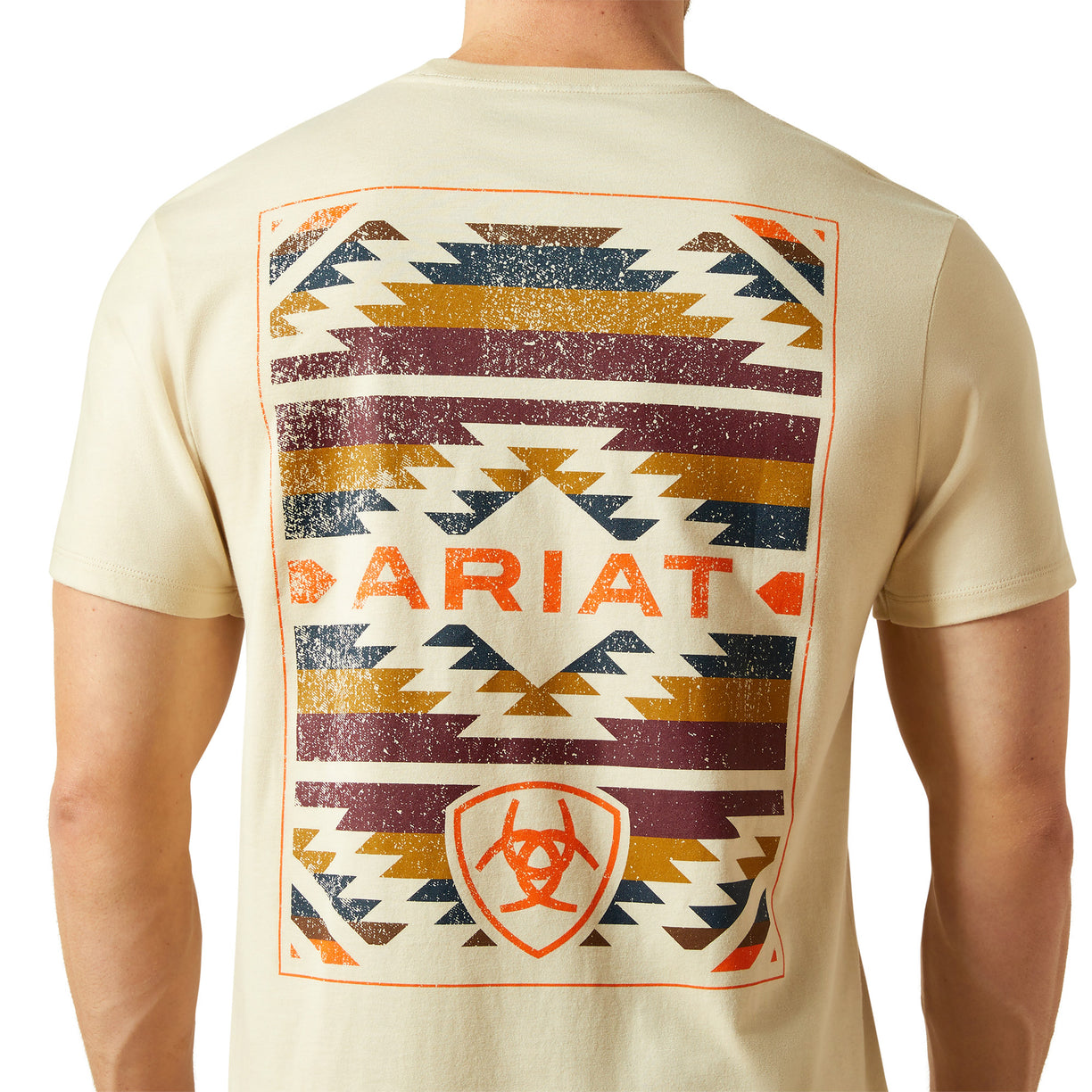Beige t-shirt with geometric pattern and 'Ariat' branding on a white background