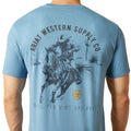 Blue t-shirt with a graphic of a cowboy on a horse and 'Ariat Western Supply Co.' text.