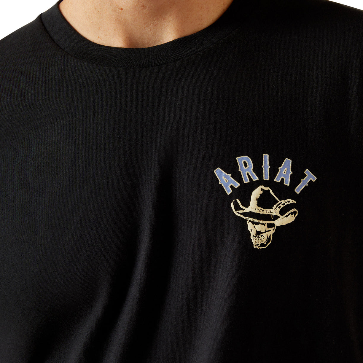 Black t-shirt with Ariat logo featuring a cowboy hat and skull design.