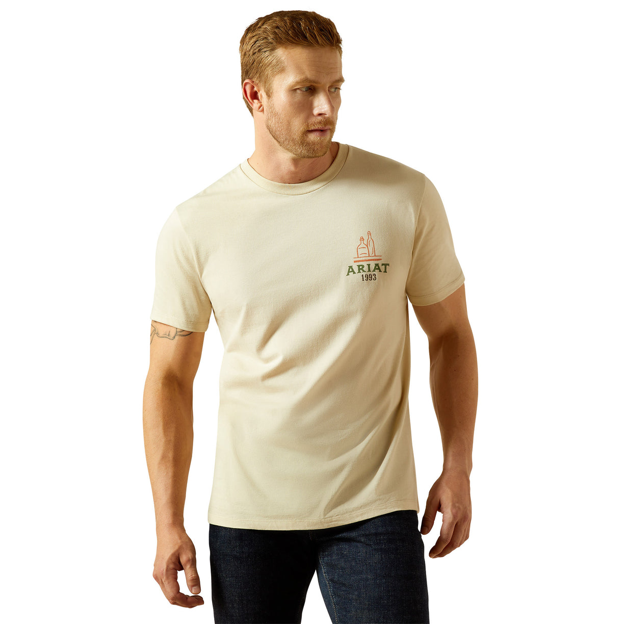 Man wearing a beige t-shirt with a logo on a white background