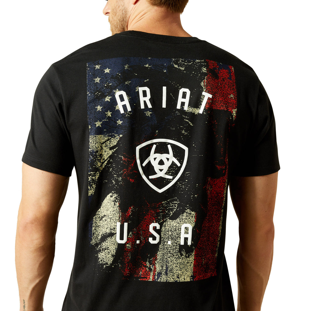 Black t-shirt with 'Ariat U.S.A' design on the back, worn by a person.
