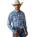 Man wearing a blue plaid shirt, jeans, and a cowboy hat on a white background