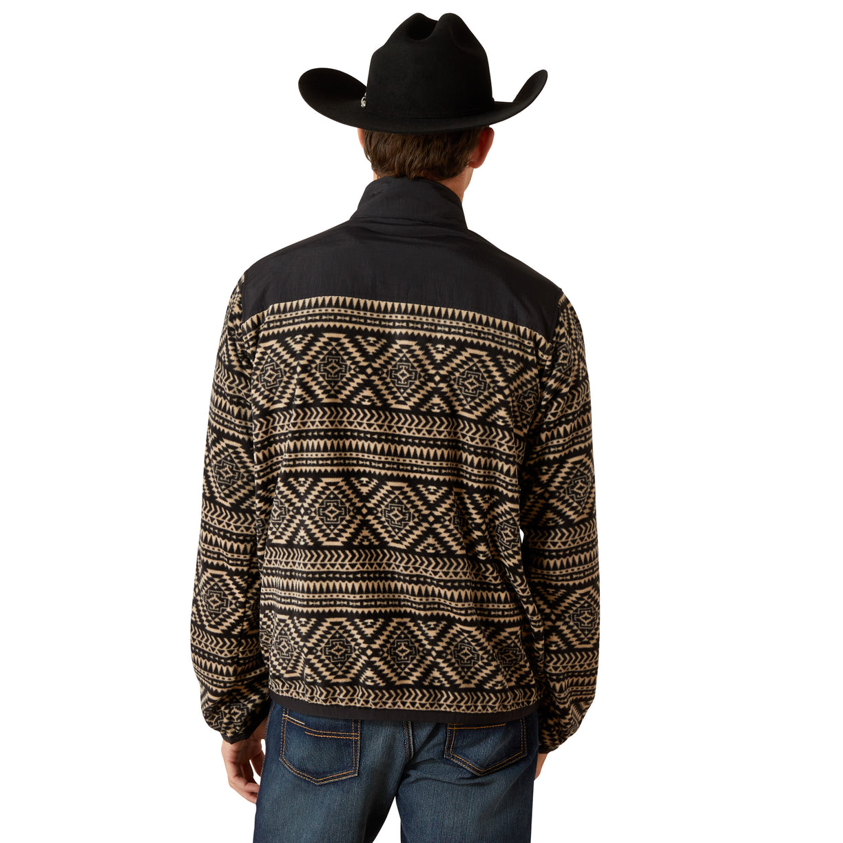 Person wearing a black and beige patterned jacket with a cowboy hat on a white background