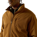 Brown jacket with a brand logo worn by a person on a white background