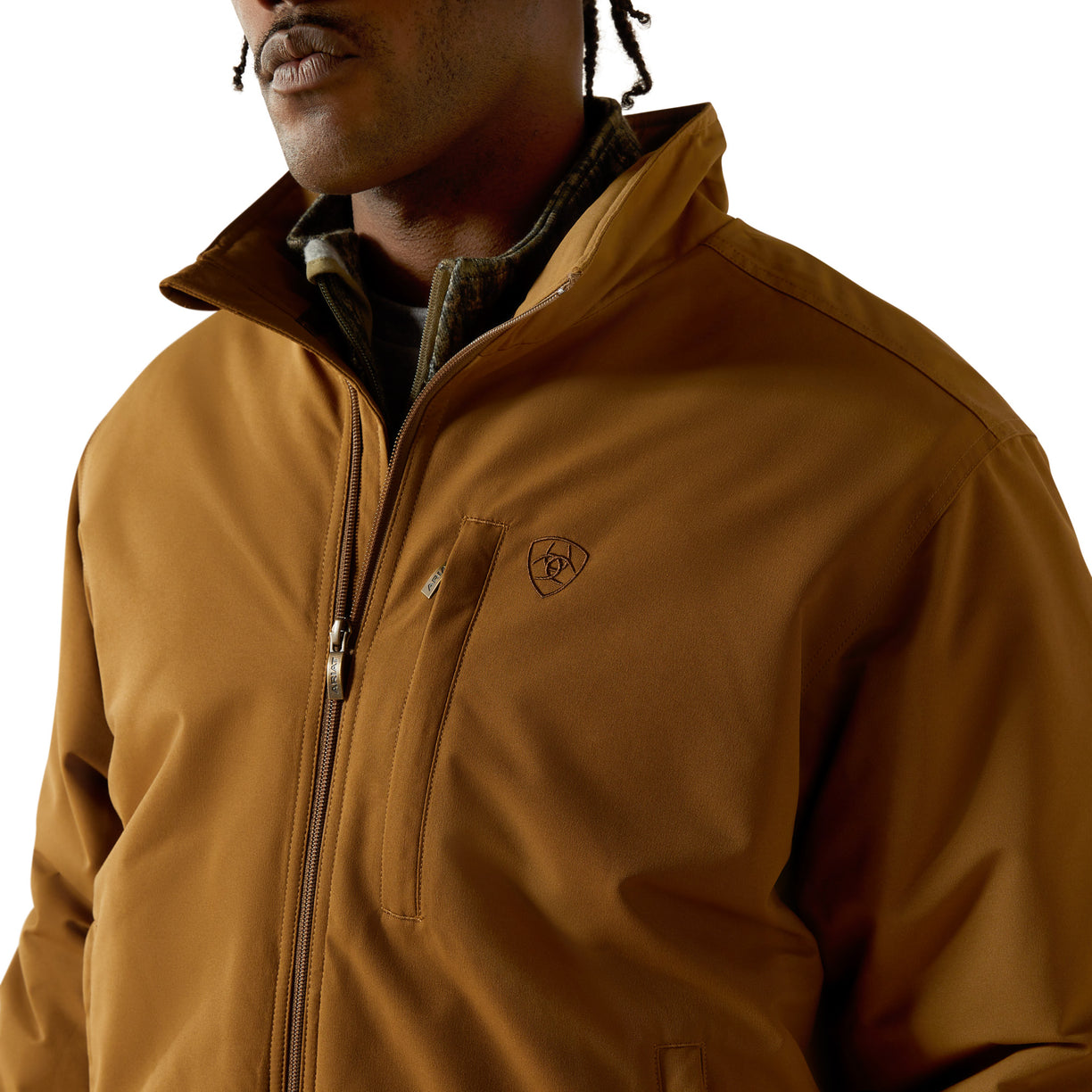 Brown jacket with a brand logo worn by a person on a white background