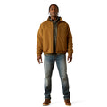 Man wearing a brown jacket and blue jeans on a white background