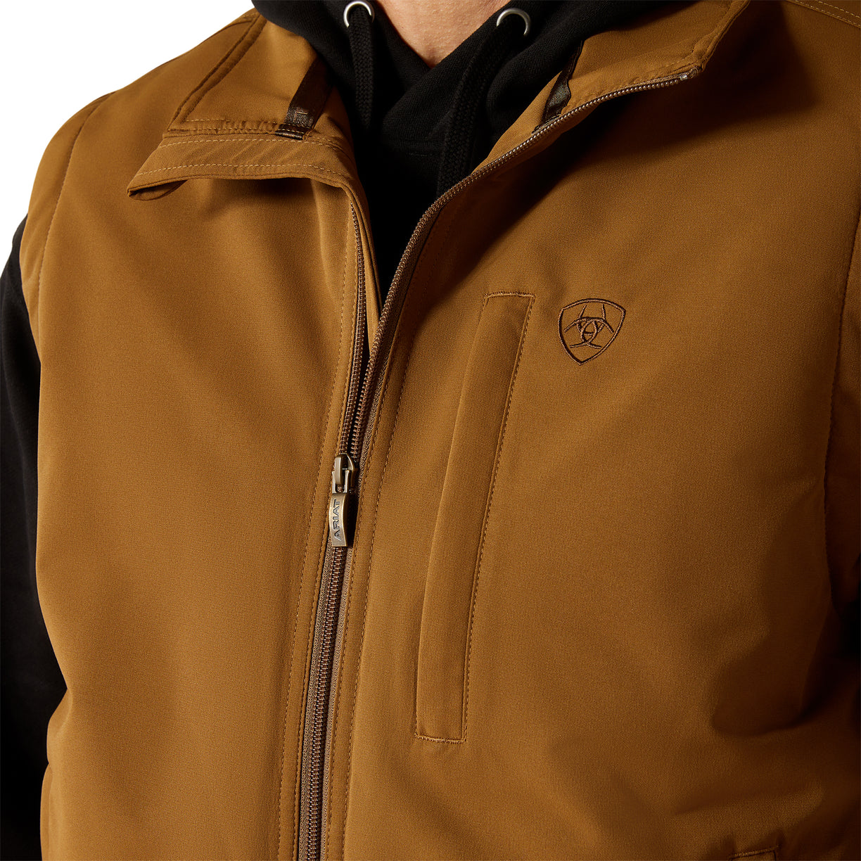 Brown jacket with a brand logo on a white background